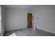 Airy bedroom with modern flooring and hallway view, offering a tranquil atmosphere and easy access at 3669 General Marshall Rd, Daytona Beach, FL 32124