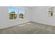 Bright and spacious carpeted bedroom that offers beautiful views at 3773 Deer Ridge Dr, Mount Dora, FL 32757