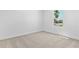 Bright bedroom with two windows that provide natural light and scenic views at 3773 Deer Ridge Dr, Mount Dora, FL 32757