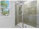 Bright, modern shower with a large window that brings in natural light at 3773 Deer Ridge Dr, Mount Dora, FL 32757