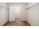 Spacious walk-in closet with ample shelving and storage, providing an organized solution at 410 Canna Dr, Davenport, FL 33897