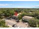 Aerial view of condos surrounded by mature trees with parking at 4820 Conway Rd # 130, Orlando, FL 32812