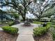Beautiful common area with park benches surrounding a relaxing water fountain at 4820 Conway Rd # 130, Orlando, FL 32812