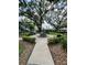 Beautiful common area with park benches surrounding a relaxing water fountain at 4820 Conway Rd # 130, Orlando, FL 32812