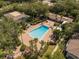 Aerial view of a community pool and surrounding amenities at 4820 Conway Rd # 130, Orlando, FL 32812