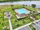 This beautiful community pool features a playground, picnic tables, and lounge chairs at 4909 Terrapin Blvd, St Cloud, FL 34771