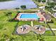 Enjoy the lake view from the pool and playground, set amidst mature trees and serene surroundings at 4909 Terrapin Blvd, St Cloud, FL 34771