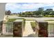Charming front porch view showcasing the neighborhood street and well-kept landscaping at 4909 Terrapin Blvd, St Cloud, FL 34771