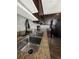 Kitchen sink features granite countertops, a modern faucet, and stainless steel appliances at 4909 Terrapin Blvd, St Cloud, FL 34771