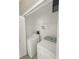 A laundry room featuring a washer, dryer, and overhead shelving for storage at 4909 Terrapin Blvd, St Cloud, FL 34771