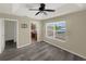 The main bedroom offers a bright window and an attached tv mount for easy viewing at 4909 Terrapin Blvd, St Cloud, FL 34771