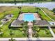 Community pool features a pool, playground, lounge chairs, and beautiful landscaping at 4909 Terrapin Blvd, St Cloud, FL 34771