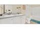 Neutral bathroom featuring double sinks, tile floors, and a shower-tub combination at 550 Castlemain Cir, Davenport, FL 33897