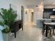 Spacious living area with modern decor and a view into the adjacent kitchen at 637 Ocean Course Ave, Davenport, FL 33896