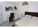 Cozy bedroom with a dedicated workspace and a bright window offering natural light at 639 Chadbury Way, Kissimmee, FL 34744
