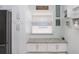 Corner area featuring built-in counter with cabinets and window for a cozy spot at 639 Chadbury Way, Kissimmee, FL 34744