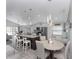 Open concept kitchen flows into the dining and living spaces at 639 Chadbury Way, Kissimmee, FL 34744