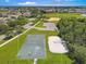 Aerial view of sports courts including basketball, volleyball, and baseball, in a Gathering-friendly community at 639 Chadbury Way, Kissimmee, FL 34744