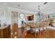 Dining room with hardwood floors and view to living and kitchen at 650 Campus St # 309, Celebration, FL 34747