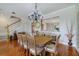 Bright dining room area with open access to kitchen and stairs to the upper level at 650 Campus St # 309, Celebration, FL 34747
