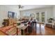 Inviting living room with hardwood floors, comfortable seating, and bright natural light at 650 Campus St # 309, Celebration, FL 34747
