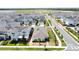 An aerial view shows homes with solar panels lining the streets of a community at 6514 Barnstorm Way, St Cloud, FL 34771