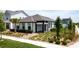 Inviting one-story home with a well-manicured lawn and beautiful landscaping at 6514 Barnstorm Way, St Cloud, FL 34771
