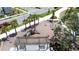 Overhead view of community playground with climbing structure, slides, swings and shaded seating areas at 6514 Barnstorm Way, St Cloud, FL 34771