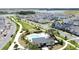 Community aerial showcasing the pool, pool house and walking paths at 6514 Barnstorm Way, St Cloud, FL 34771
