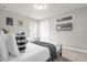 Comfortable bedroom featuring two twin beds and playful decor at 7211 Oakmoss Loop, Davenport, FL 33837