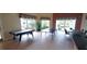 Fun game room with air hockey and ping pong tables, perfect for entertainment and social gatherings at 8809 Dunes Ct # 201, Kissimmee, FL 34747