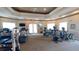 Well-equipped gym with modern exercise machines and ample space for a complete workout at 8809 Dunes Ct # 201, Kissimmee, FL 34747