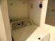 White washing machine in the laundry room ready to use at 8809 Dunes Ct # 201, Kissimmee, FL 34747
