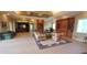 Inviting lounge with tile floors, built-in bookshelves, and comfortable seating for relaxation at 8809 Dunes Ct # 201, Kissimmee, FL 34747