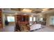 Well-lit lounge features built-in shelving, cozy seating, and a relaxing atmosphere for residents at 8809 Dunes Ct # 201, Kissimmee, FL 34747