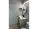 Updated bathroom features new marble look tile and modern vanity at 352 Madina Cir, Davenport, FL 33837