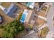 Aerial shot showcasing a home with a private pool, well-kept landscaping, and neighborhood layout at 1007 Maya Ave, Orlando, FL 32822