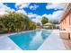 Inviting pool with poolside gazebo and clear blue skies is perfect for relaxation and entertaining at 1007 Maya Ave, Orlando, FL 32822