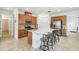Modern kitchen with an island, stainless steel appliances, and sleek countertops for a gourmet cooking experience at 1014 Umbria Dr, Kissimmee, FL 34759