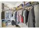 Well-organized walk-in closet providing ample storage space with shelving and hanging rods, perfect for clothing and accessories at 1014 Umbria Dr, Kissimmee, FL 34759