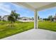 Backyard with a green lawn at 1019 Cloud Ridge Ct, Mount Dora, FL 32757