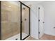 Beautiful tiled walk-in shower with glass door at 1019 Cloud Ridge Ct, Mount Dora, FL 32757