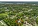 Beautiful aerial view of a secluded home surrounded by mature trees and nearby water at 1081 Se 174Th Ter, Silver Springs, FL 34488