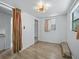 Bright bedroom with a modern light fixture and wood laminate flooring at 1081 Se 174Th Ter, Silver Springs, FL 34488