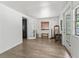 Bright, open living room with hardwood floors, white walls, and natural light at 1081 Se 174Th Ter, Silver Springs, FL 34488