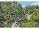 Aerial view of home with mature trees and brick driveway at 1104 E Anderson St, Orlando, FL 32801