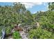 Aerial view of home with mature trees and brick driveway at 1104 E Anderson St, Orlando, FL 32801