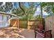 Large backyard deck with seating and privacy fence at 1104 E Anderson St, Orlando, FL 32801