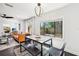 Dining area with modern furnishings and natural light, connecting seamlessly to the living area and kitchen at 1104 E Anderson St, Orlando, FL 32801