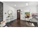 Stylish entryway with wood floors, modern decor, and lots of natural light at 1104 E Anderson St, Orlando, FL 32801